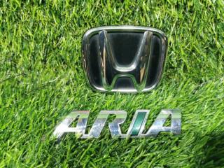 Эмблема HONDA FIT ARIA GD9 75715-SEL-T11ZD 2 ракурс Эмблема HONDA FIT ARIA GD9 75715-SEL-T11ZD 2 ракурс