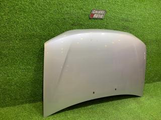 Капот передний MAZDA DEMIO DW3W D26752310 4 ракурс Капот передний MAZDA DEMIO DW3W D26752310 4 ракурс