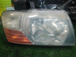 Фара галогеновая передняя правая Mitsubishi Pajero 2004