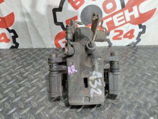 Суппорт тормозной задний правый CEFIRO A32 VQ20DE