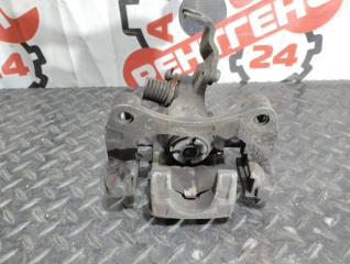 Суппорт тормозной задний правый CEFIRO A32 VQ20DE