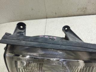 Фара левая передняя MITSUBISHI MINICA H22A 001-7043 2 ракурс