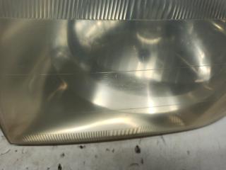 Фара левая передняя MITSUBISHI PAJERO IO H66W 100-87312 2 ракурс