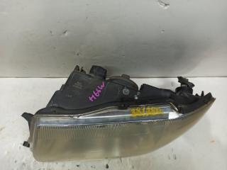 Фара левая передняя MITSUBISHI PAJERO IO H66W 100-87312 3 ракурс