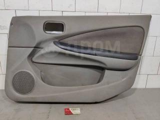 Запчасть обшивка двери передняя правая Nissan Almera 2000-2002