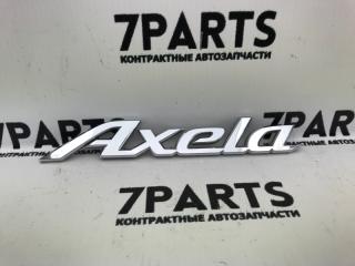 Запчасть эмблема MAZDA AXELA