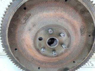 Маховик NISSAN MARCH K11 CG10DE 12310AN000 4 ракурс