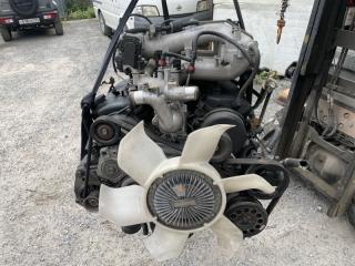 Двигатель MITSUBISHI PAJERO V83W 6G72 1000A657 1 ракурс