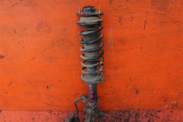 Запчасть стойка подвески передняя левая NISSAN CUBE 1999