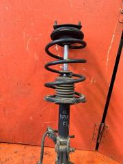 Запчасть стойка подвески передняя левая NISSAN WINGROAD 2000