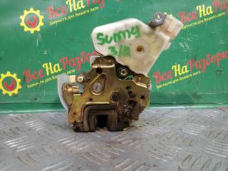 Замок двери задний левый Nissan Sunny