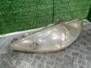 Фара левая Peugeot 206 2003