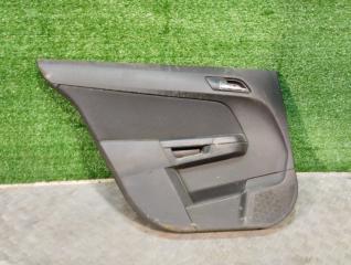 Обшивка задней левой двери Opel Astra h