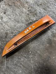 Накладка на фару левая Isuzu Elf 1998