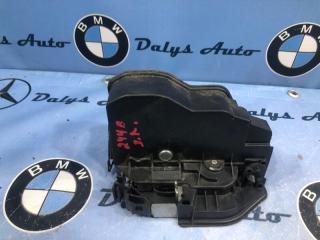 Замок двери задний левый BMW 130 2006