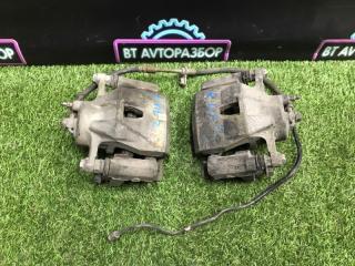 Суппорт тормозной передний левый Toyota Vitz