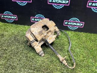 Суппорт тормозной задний левый Toyota Crown 1992