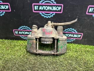 Запчасть суппорт тормозной передний левый Mazda Familia 1990