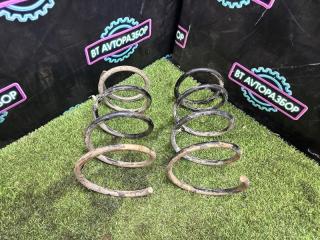 Запчасть пружина подвески передняя Mazda Familia 1990