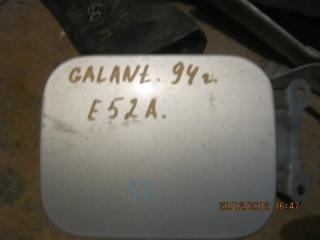 Фото запчасти лючок бензобака MITSUBISHI GALANT 1994 контрактная запчасть Запчасть лючок бензобака MITSUBISHI GALANT 1994