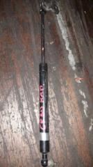 Амортизатор капота передний левый Toyota Land Cruiser 1995 Б/У Амортизатор капота передний левый Toyota Land Cruiser 1995