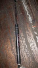 Амортизатор капота передний Toyota Land Cruiser 1998 Б/У Амортизатор капота передний Toyota Land Cruiser 1998