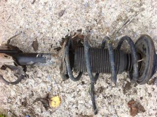 Стойка подвески передняя правая Nissan Presea 1990