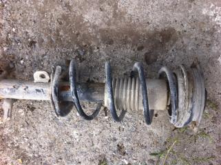 Стойка подвески передняя левая Nissan March 2003