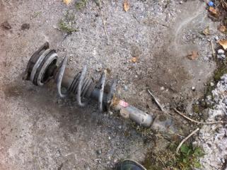 Стойка подвески передняя Nissan NOTE 2003