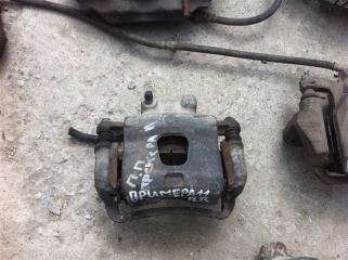 Суппорт передний правый Nissan Primera 2000