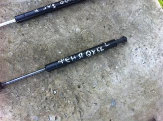 Амортизатор капота Infiniti QX56 Б/У Амортизатор капота Infiniti QX56