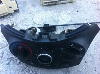 Фото запчасти блок управления климат-контролем HYUNDAI Solaris 2011 Б/У запчасть Запчасть блок управления климат-контролем HYUNDAI Solaris 2011