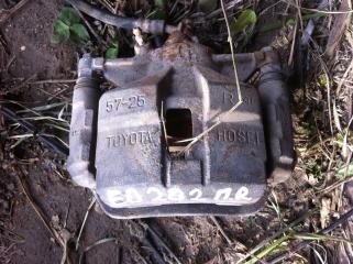 Суппорт передний правый Toyota Carina ED