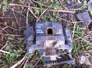 Запчасть суппорт задний левый Subaru LEGACY B4