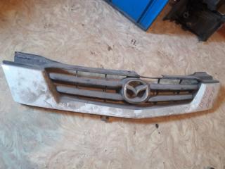 Решетка радиатора Mazda Demio 2001 Б/У Решетка радиатора Mazda Demio 2001