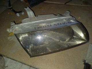 Фара Mazda Familia 1997