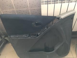 Запчасть обшивка двери передняя левая Toyota Vitz