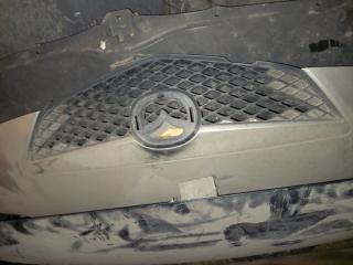 Решетка радиатора Mazda Demio 2005 Б/У Решетка радиатора Mazda Demio 2005