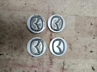 Запчасть заглушка колесного диска mazda 6 2003