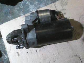 Фото запчасти стартер Opel Astra контрактная запчасть Запчасть стартер Opel Astra