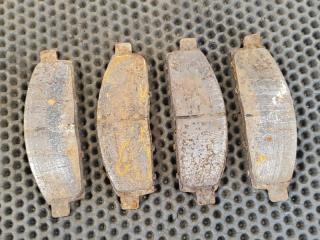 Фото запчасти колодки тормозные передние Mitsubishi L200 2011 контрактная запчасть Запчасть колодки тормозные передние Mitsubishi L200 2011