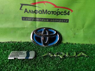 Фото запчасти эмблема задняя TOYOTA AQUA контрактная запчасть Запчасть эмблема задняя TOYOTA AQUA