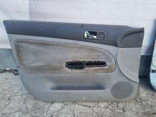 Обшивка двери передняя левая Volkswagen Passat 2000