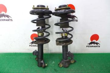 Стойка подвески передняя Nissan Primera 2004