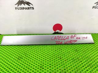 Накладка крышки багажника Mazda Capella 1997 контрактная Накладка крышки багажника Mazda Capella 1997