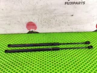 Запчасть амортизатор капота Volkswagen Touareg 2009