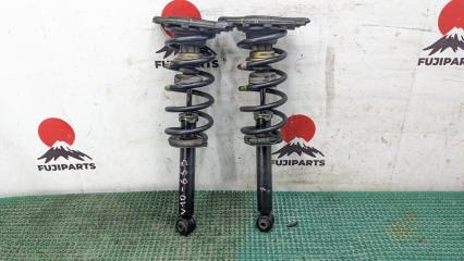 Стойка подвески задняя Nissan Tino 1999