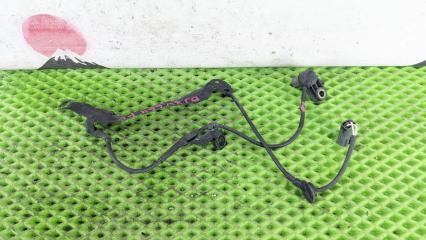 Запчасть датчик abs передний левый Mazda Familia S-Wagon 1998