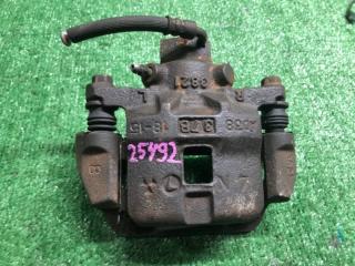 Запчасть суппорт тормозной задний левый Subaru Legacy