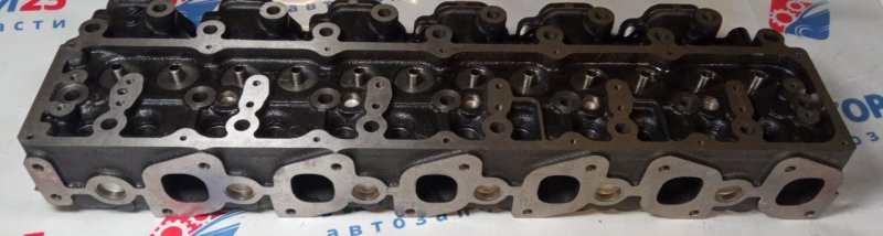 Головка блока цилиндров пустая Nissan 1103906J00